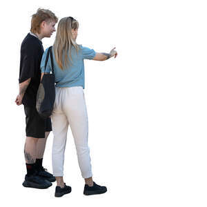 man and woman standing by a touchscreen