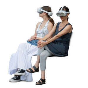 two women with VR glasses sitting