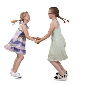 two girls holding hands and dancing