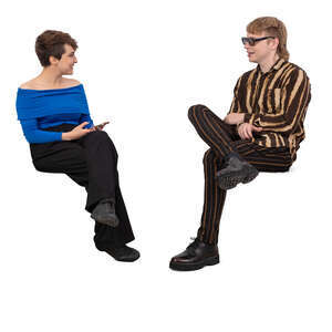 woman and a man sitting and talking