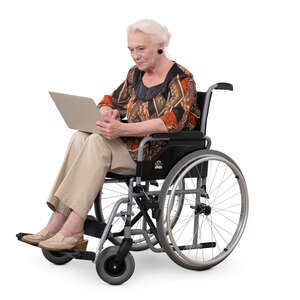 elderly lady with a laptop sitting in a wheel chair