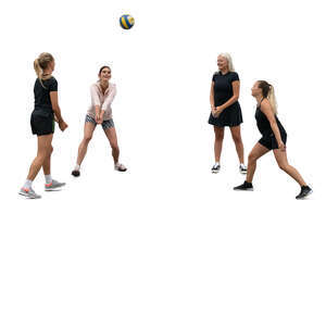 group of women playing volleyball