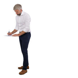 man standing and writing smth on the desk