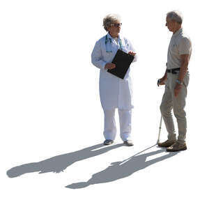 backlit doctor talking to an elderly male patient