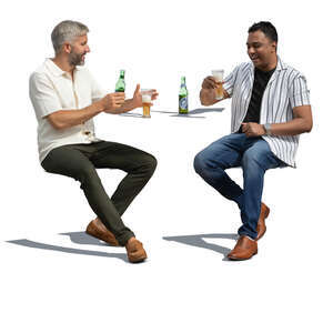 two men sitting happily in a cafe and drinking beer