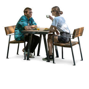 man and woman sitting in a partial shade and drinking coffee