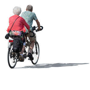 elderly couple riding a tandem bike