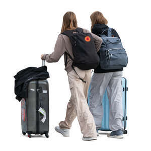 two young women with many bags walking