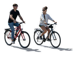 backlit man and woman cycling