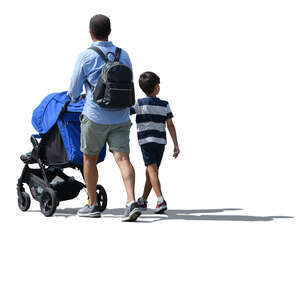 man walking pushing a stroller and holding his son by the hand