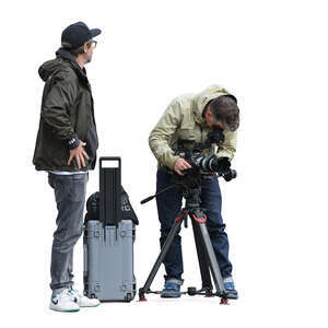 two men setting up a tripod with photo camera