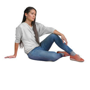 woman sitting casually on the ground