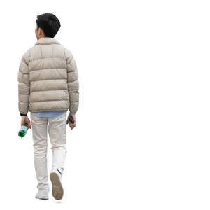 asian man in a light beige bomber jacket walking