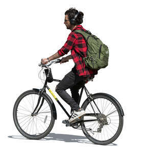 man with a backpack and headphones riding a bike