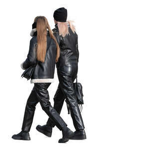 two women dressed in black leather walking