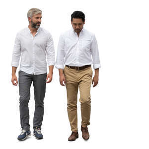 two men in white shirts walking