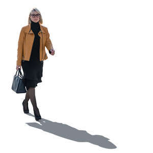 backlit woman walking