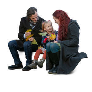 family in autumn sitting and talking