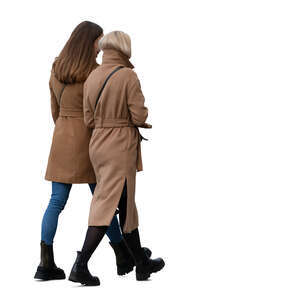 two women wearing camel overcoats walking