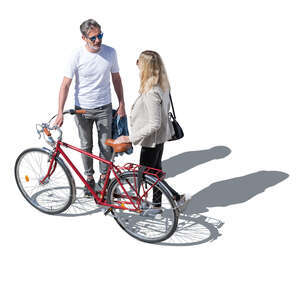 top view of a man and woman with a bike standing and talking