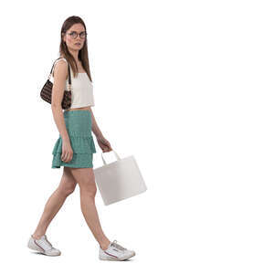 woman with a shopping bag walking