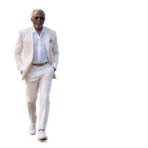 older black man in a white suit walking