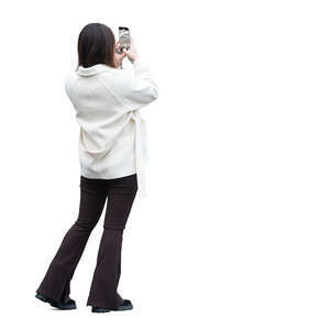 woman taking a picture with her phone