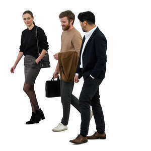 three modern office workers walking together