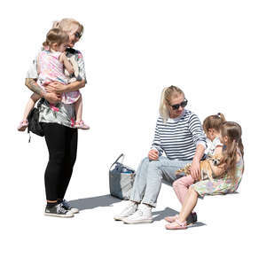 two cut out women with their daughters sitting and standing