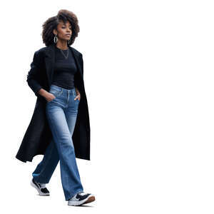 black woman with a black overcoat walking