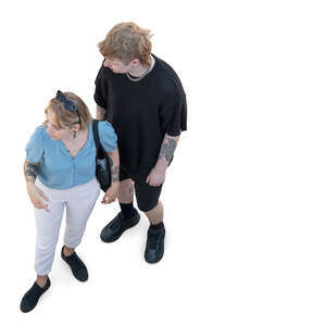 two cut out people standing seen from above