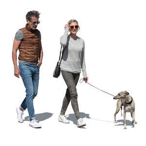 cut out man and woman walking a dog