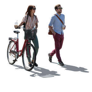 backlit woman and man walking in the street with coffee