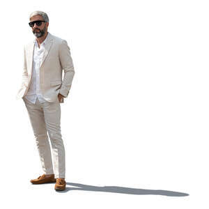 cut out backlit man in a white suit standing