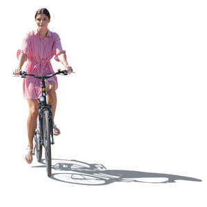 cut out backlit woman in a striped dress riding a bike