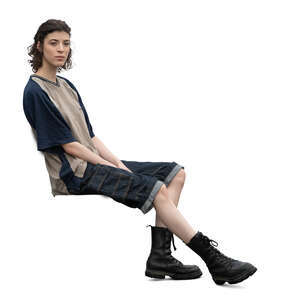 cut out woman in tank boots sitting