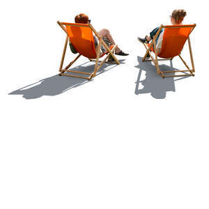 backlit women relaxing in garden chairs