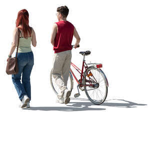 cut out backlit two teens with a bike walking