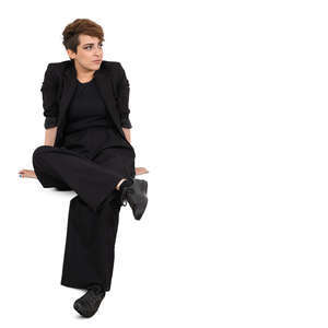 cut out woman wearing a black suit sitting