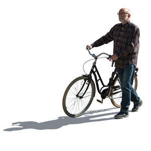 cut out backlit elderly man walking with a bike