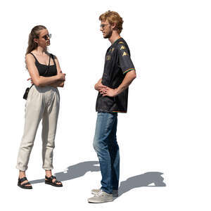 two people standing and talking