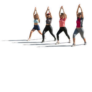 cut out backlit group of women doing yoga exercises