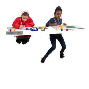 two cut out girls painting behind the table