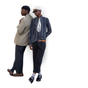 two cut out black men standing and leaning against the wall