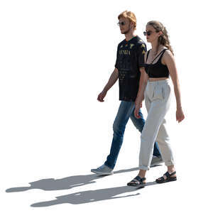 two cut out backlit people walking in summer