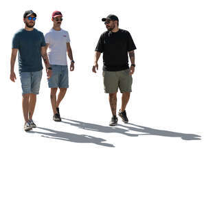 backlit group of men walking