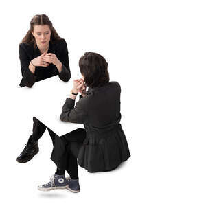 two women sitting and talking seen from above