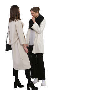 two chic women standing and talking