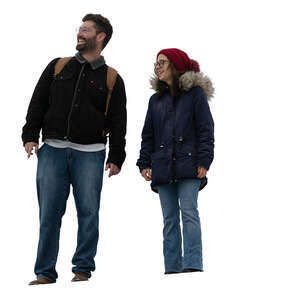 two cut out people standing in winter seen from below