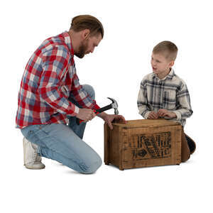 father and son building a crate together